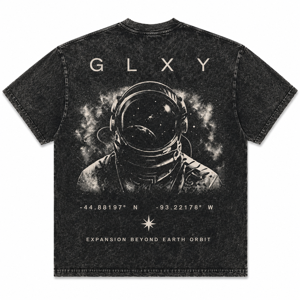 GLXY Mission 001 Orbit 1 acid wash black t-shirt featuring astronaut graphic and expansion beyond earth orbit artwork
